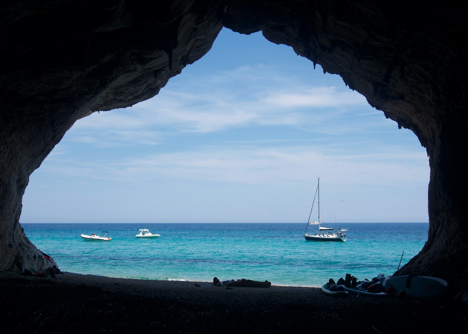 A tour boat inside a sea cave